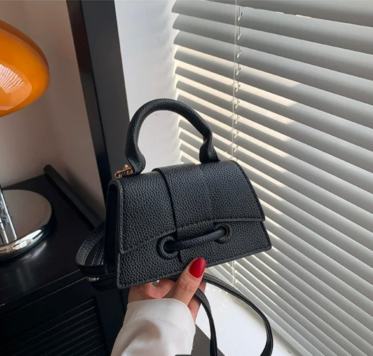 Solid Sm crossbody and shoulder strap bag.
