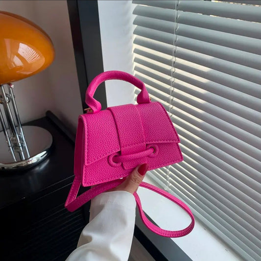 Solid Sm crossbody and shoulder strap bag.